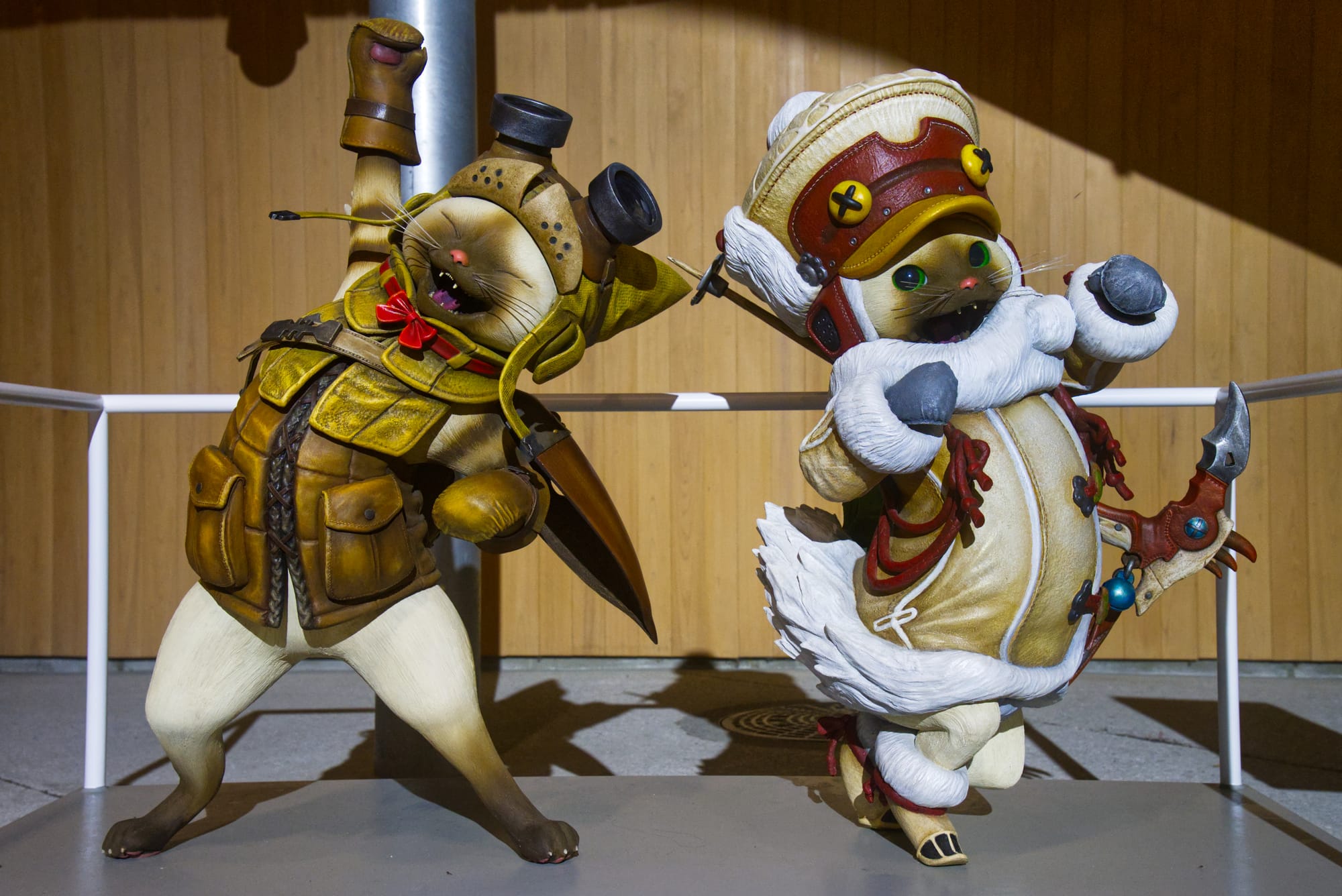 Two Felyne dressed up and looking enthusiastic