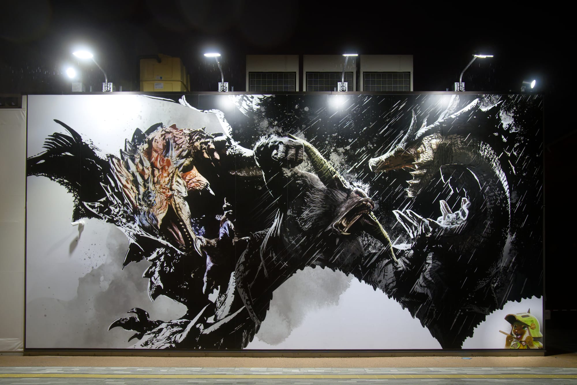 Monster Hunter mural shows several creatures, joined by a Felyne in the bottom right corner